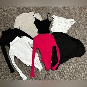 Bundle of size M/L bodysuits